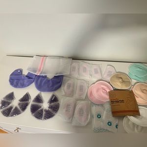 Never used! Nursing pads and warmer